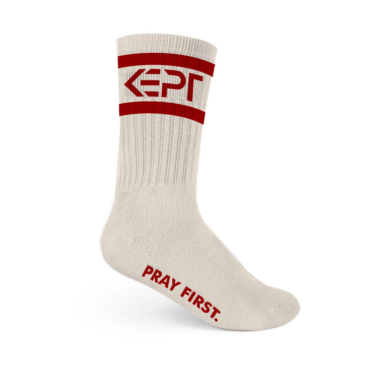 Off-white socks from KEPT with the words “Pray First” written on them.